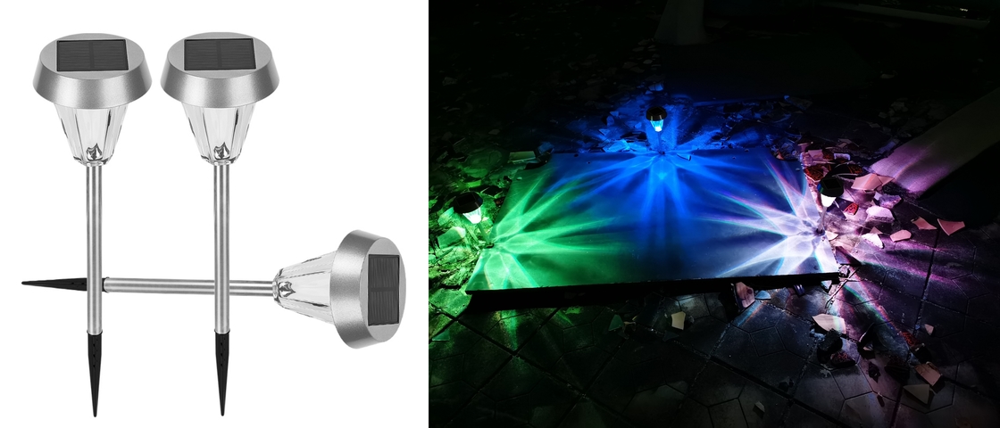 Il paesaggio alimentato solare al suolo di abbellimento accende la luce variopinta del giardino